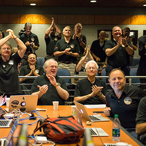 Part of the New Horizons team celebrating the spacecraft's flyby of Pluto.